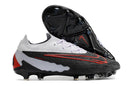 Chuteira Nike Phantom GX Low Elite FG Campo